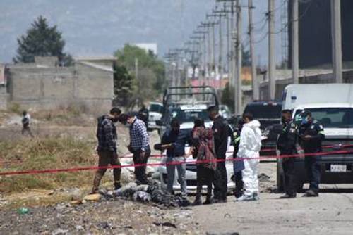 Encuentran en San Mateo Atenco, dos cuerpos envueltos en cinta canela